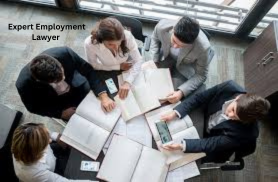 “Expert Employment Lawyer team reviewing workplace documents during a legal consultation in Australia.”