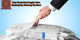 A hand pulling another person’s hand out from a large pile of bills and financial documents, symbolizing bankruptcy attorney services offering relief.