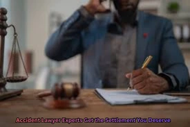 Accident lawyer reviewing documents while speaking on the phone, symbol of legal justice on the desk — Accident Lawyer Experts | Get the Settlement You Deserve