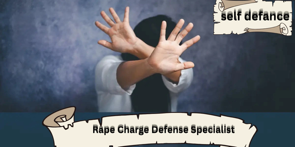 “Woman raising her hands defensively with text ‘Rape Charge Defense Specialist’ and ‘self defance’ on illustrated banners.”