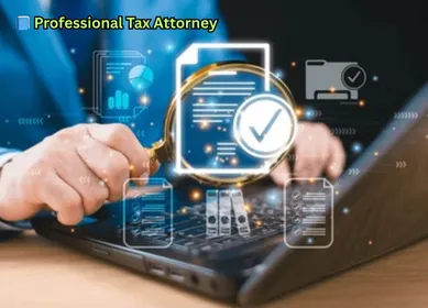 “Professional tax attorney reviewing digital financial documents with magnifying glass on laptop.”
